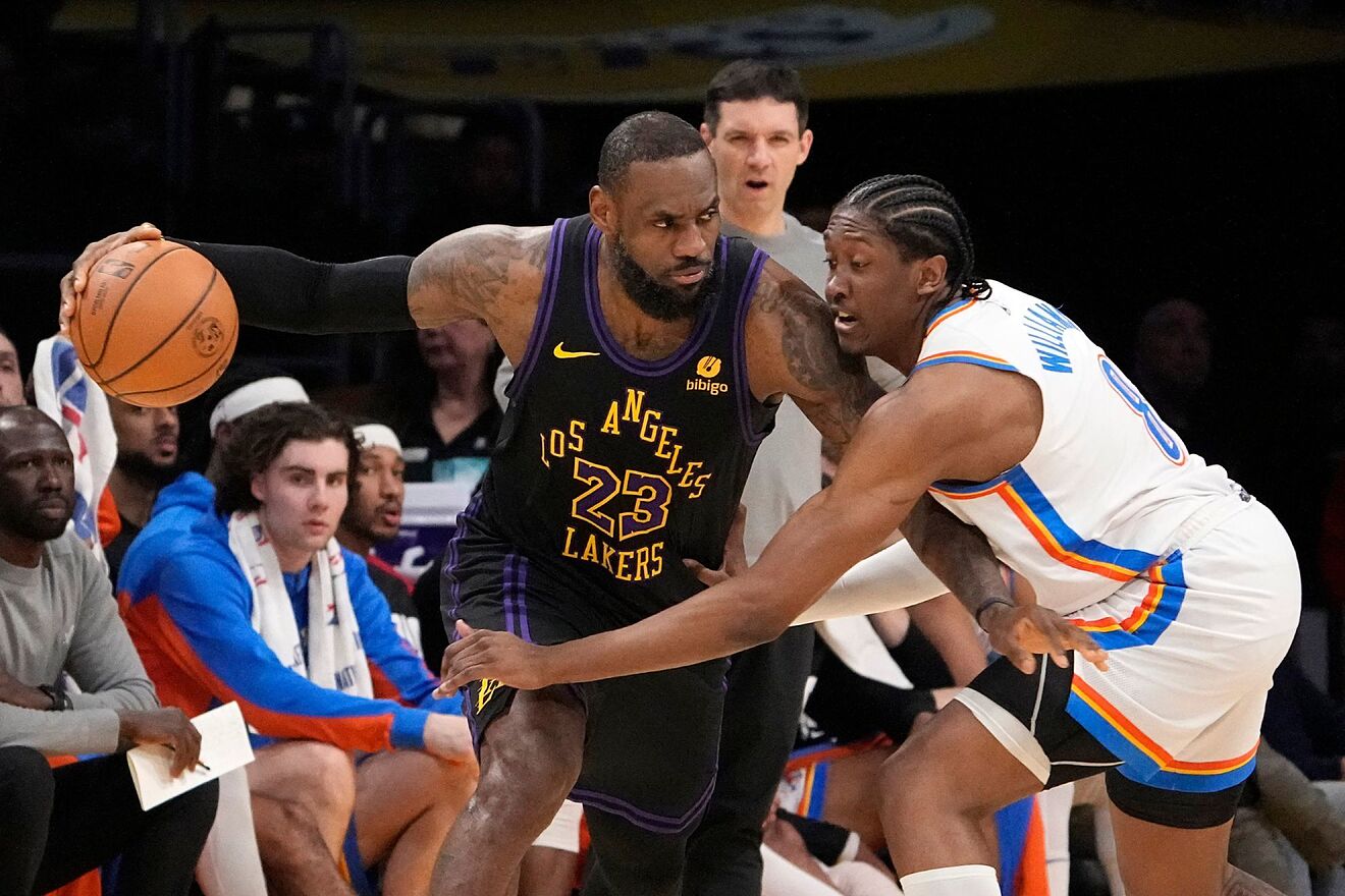 LeBron James visibly upset after fan hugs him on Lakers bench in win...