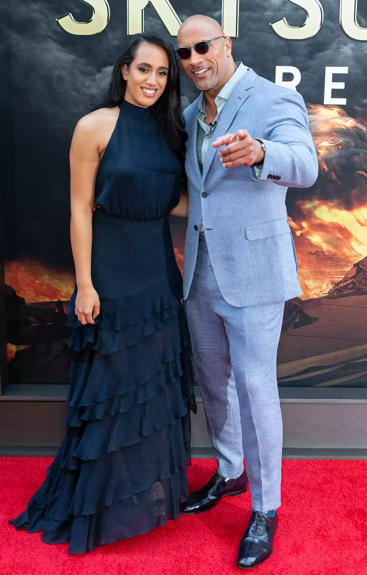 Simone Johnson and Dwayne Johnson attend the premiere of Skyscraper at AMC Loews Lincoln Center.