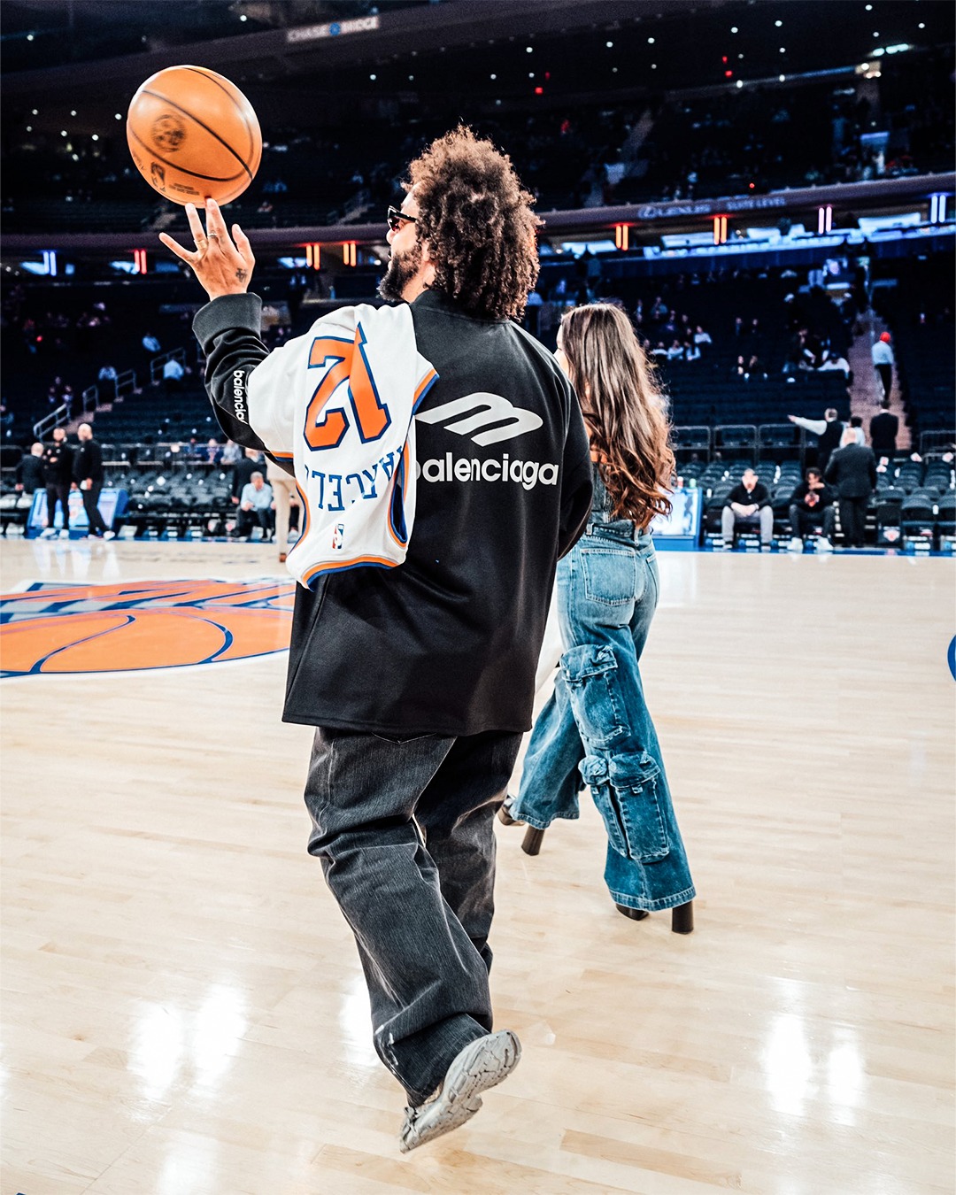 May be an image of 9 people, basketball jersey, crowd and text