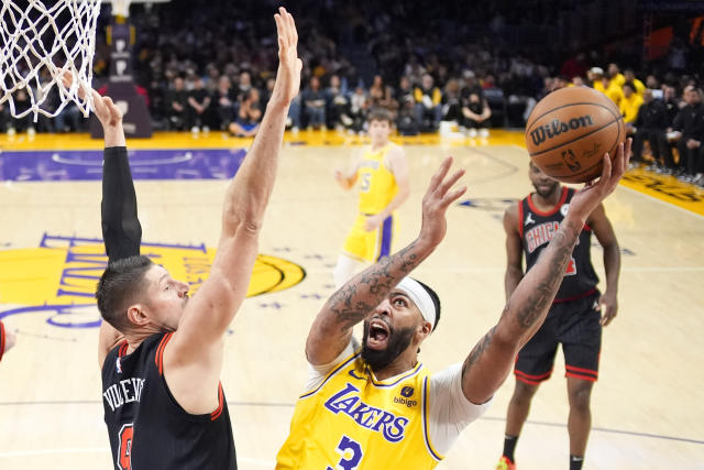 LeBron, Russell lead the Lakers' impressive shooting in a 141-132 victory  over Chicago