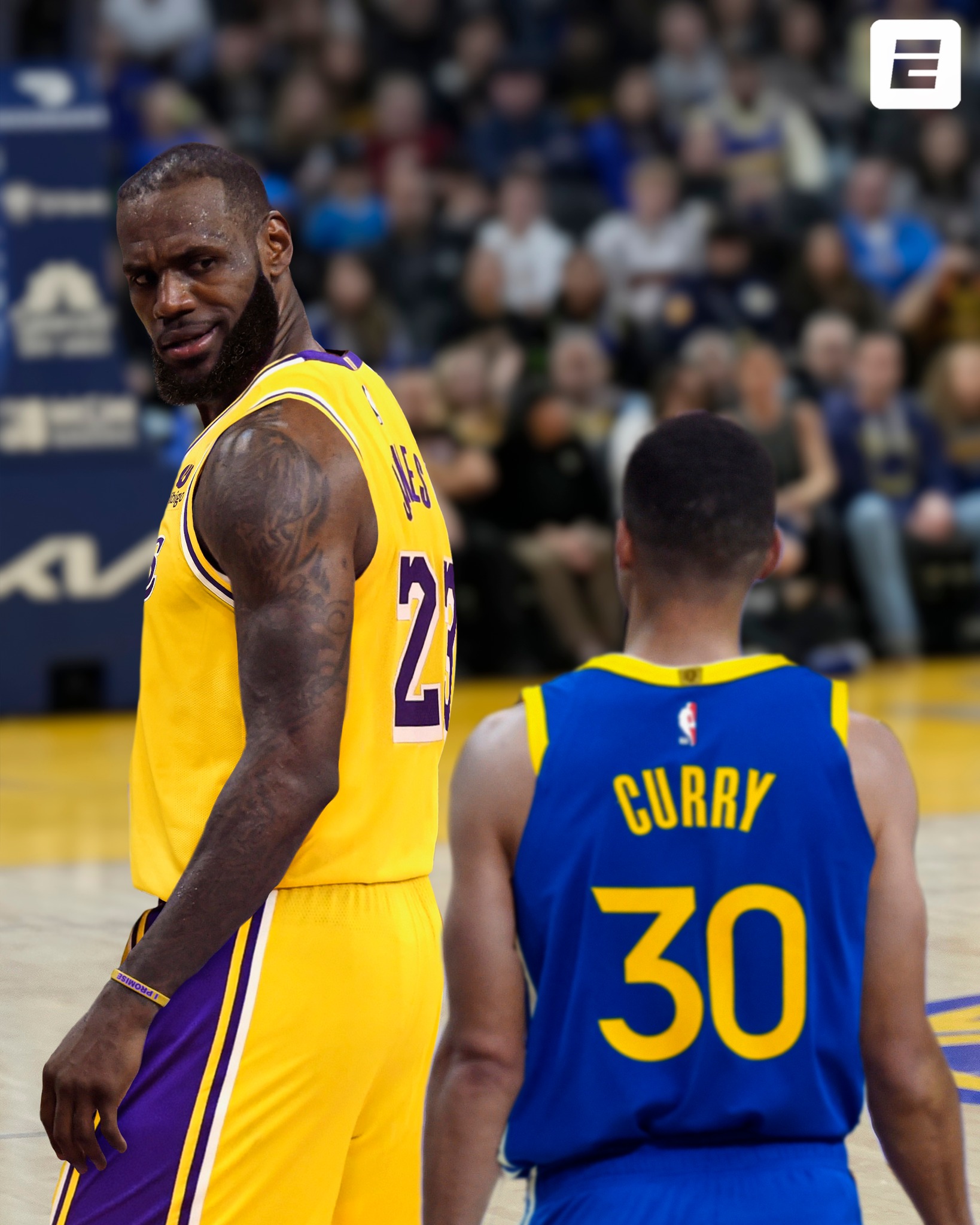 May be an image of 2 people, people playing basketball, basketball jersey and text that says "2 2 CURRY 30"