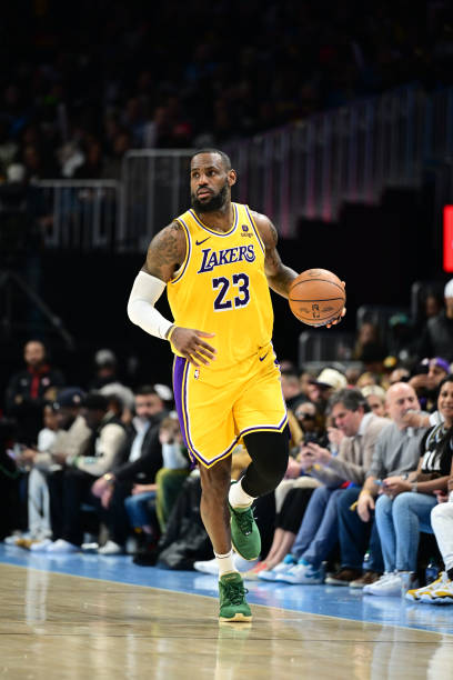 LeBron James of the Los Angeles Lakers handles the ball during the game against the Atlanta Hawks on January 30, 2024 at State Farm Arena in Atlanta,...