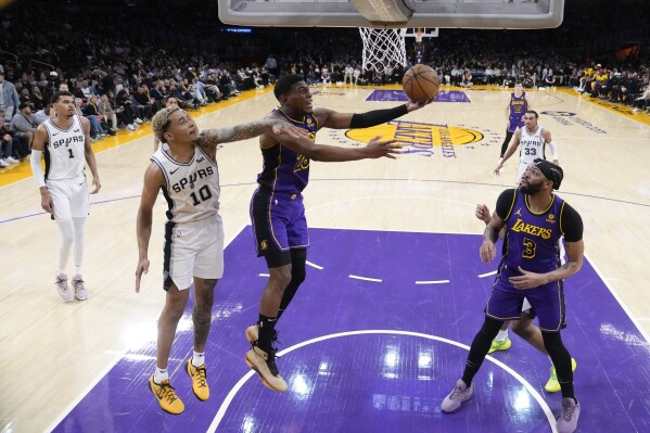 LeBron scores 30 points, Davis handles Wembanyama's 5x5 effort in Lakers'  123-118 win over Spurs | AP News