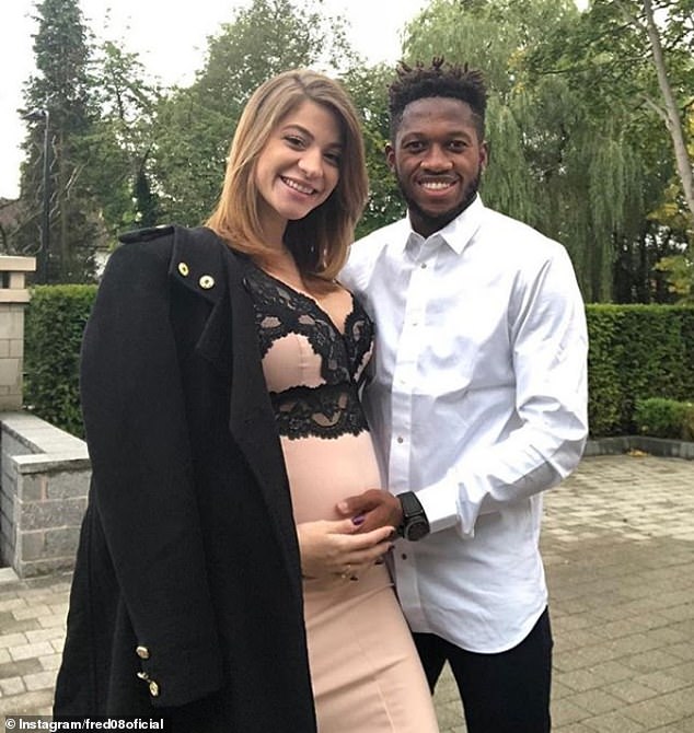 The Manchester United midfielder, 25, pictured posing with Monique during her pregnancy 