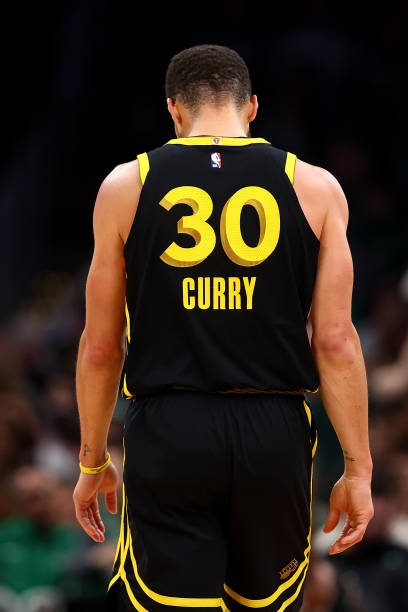 Stephen Curry of the Golden State Warriors looks on during the second quarter against the Boston Celtics at TD Garden on March 03, 2024 in Boston,...