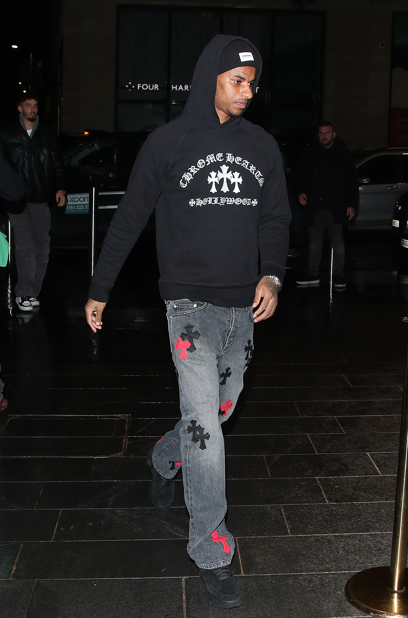 Marcus Rashford arrived in a hoodie and jeans