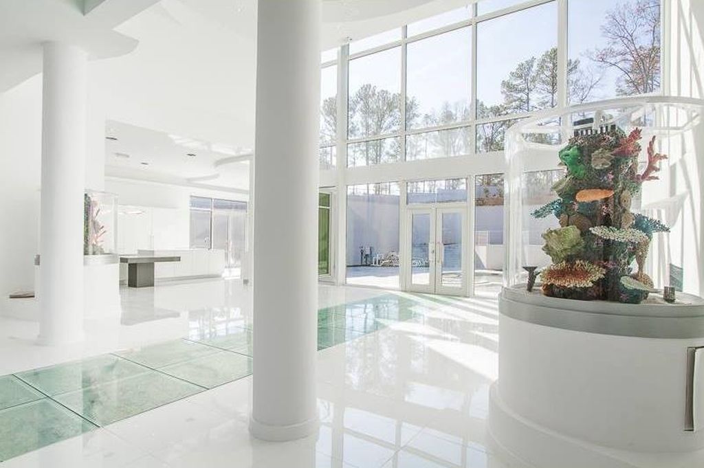 PHOTOS: Rapper Akon lists icy white N. Fulton home for nearly $7M