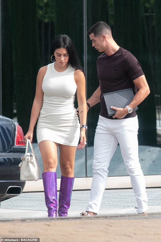Looking good: Georgina Rodriguez put on a very leggy display as she stepped out with boyfriend Cristiano Ronaldo in Madrid on Saturday