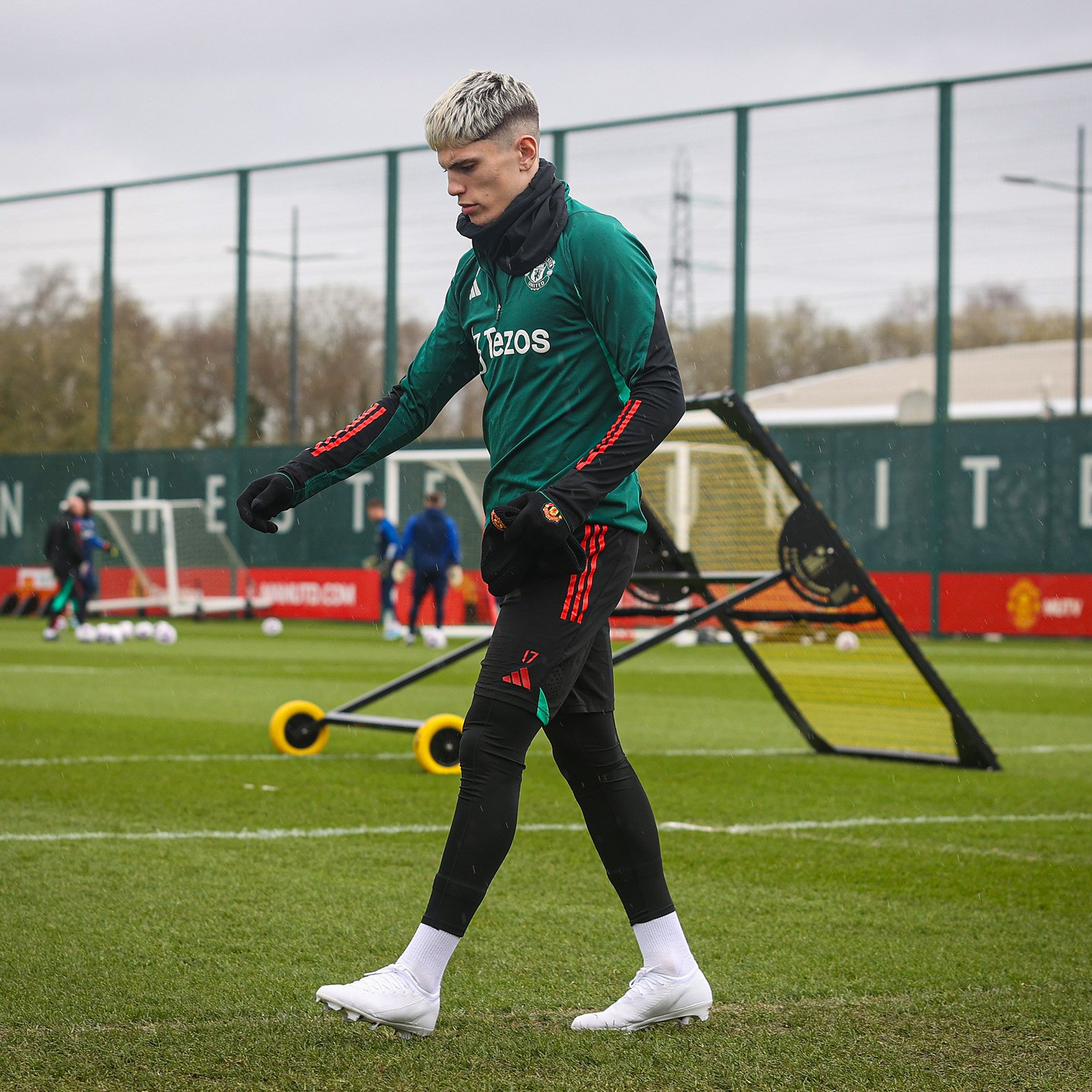 Alejandro Garnacho walks out for training at Carrington.