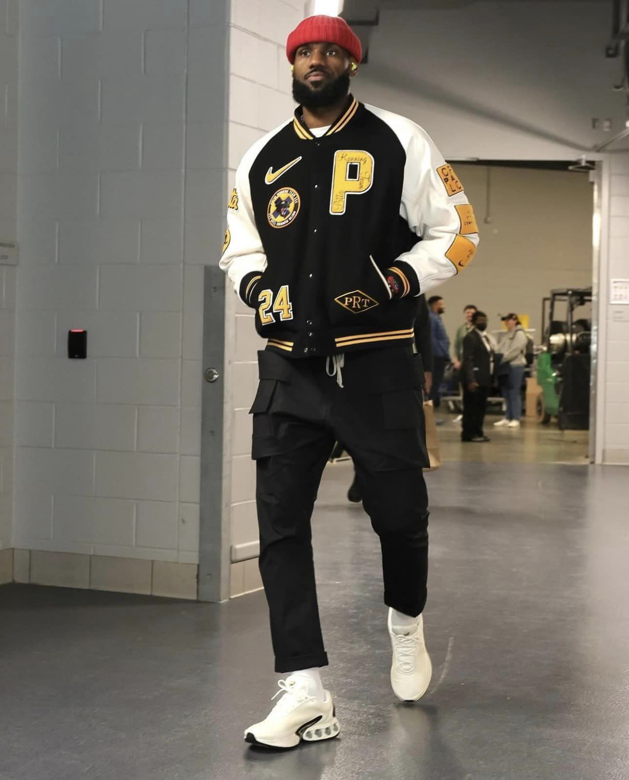 Lebron James showed off the HAPPY AIR MAX DAY shoe when fans caught him laughing at the Lakers during the match against the Bucks