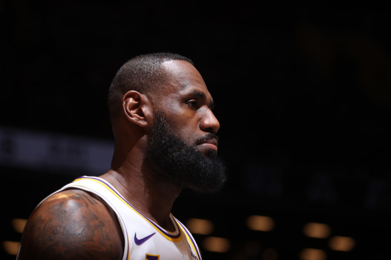 BROOKLYN, NY - MARCH 31: LeBron James #23 of the Los Angeles Lakers looks on during the game on March 31, 2024 at Barclays Center in Brooklyn, New York. NOTE TO USER: User expressly acknowledges and agrees that, by downloading and or using this Photograph, user is consenting to the terms and conditions of the Getty Images License Agreement. Mandatory Copyright Notice: Copyright 2024 NBAE (Photo by Nathaniel S. Butler/NBAE via Getty Images)