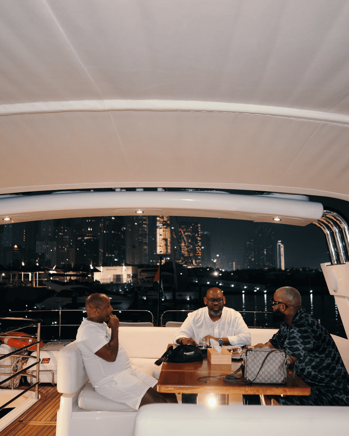 Cassper Nyovest in a yatch with his two friends. Picture: X@CassperNyovest