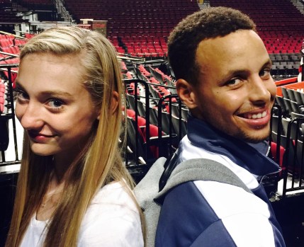 Cameron Brink and Stephen Curry pose after a Warriors-Trail Blazers game in Portland, Ore. (Photo courtesy of Shelly Bain-Brink) 