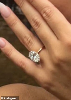 The YouTuber shared a close-up photo of her oval-cut diamond ring, which sat on a gold band