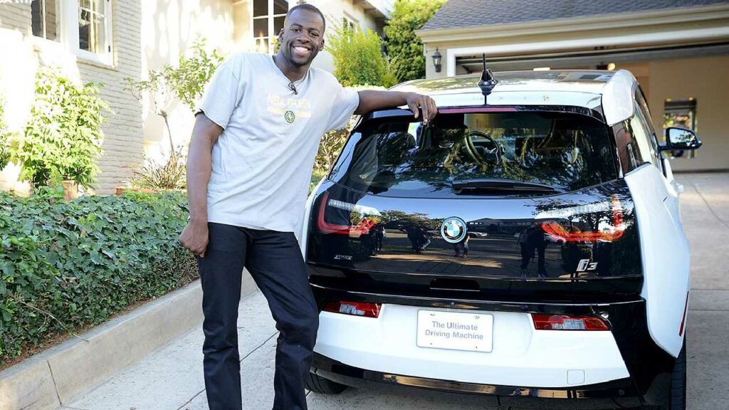 Draymond Green with his BMW i3