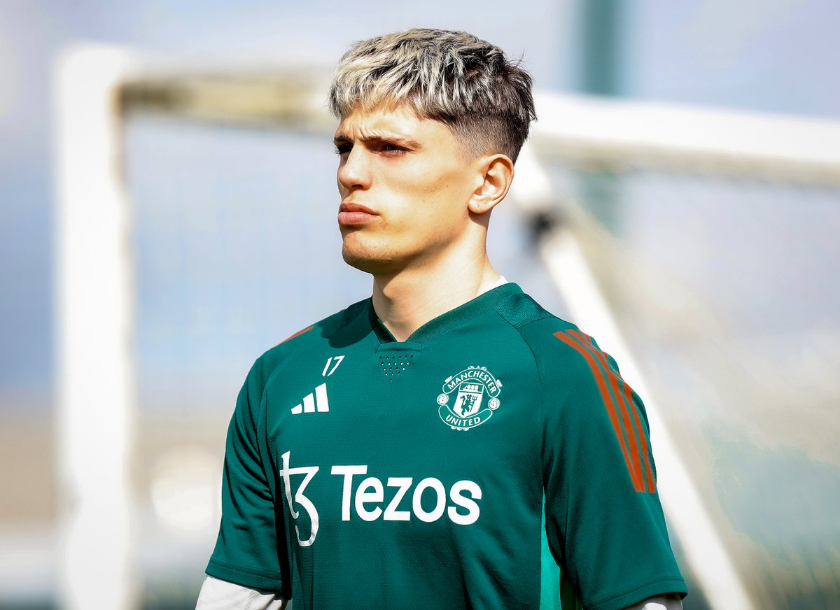 Alejandro Garnacho walks out to training.