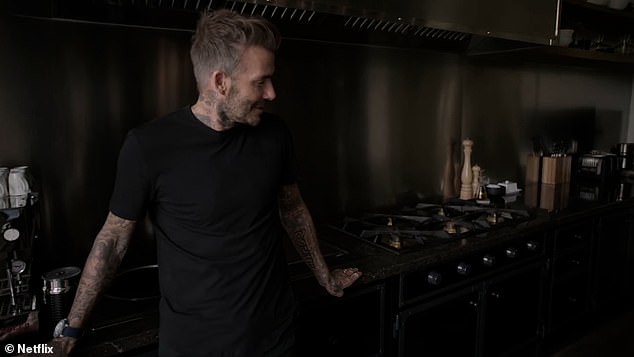 Swanky: Viewers were later shown the rustic Cotswolds kitchen which is renovated from head to toe, with chic dark grey cupboards complete with gold handles and concealed fridge