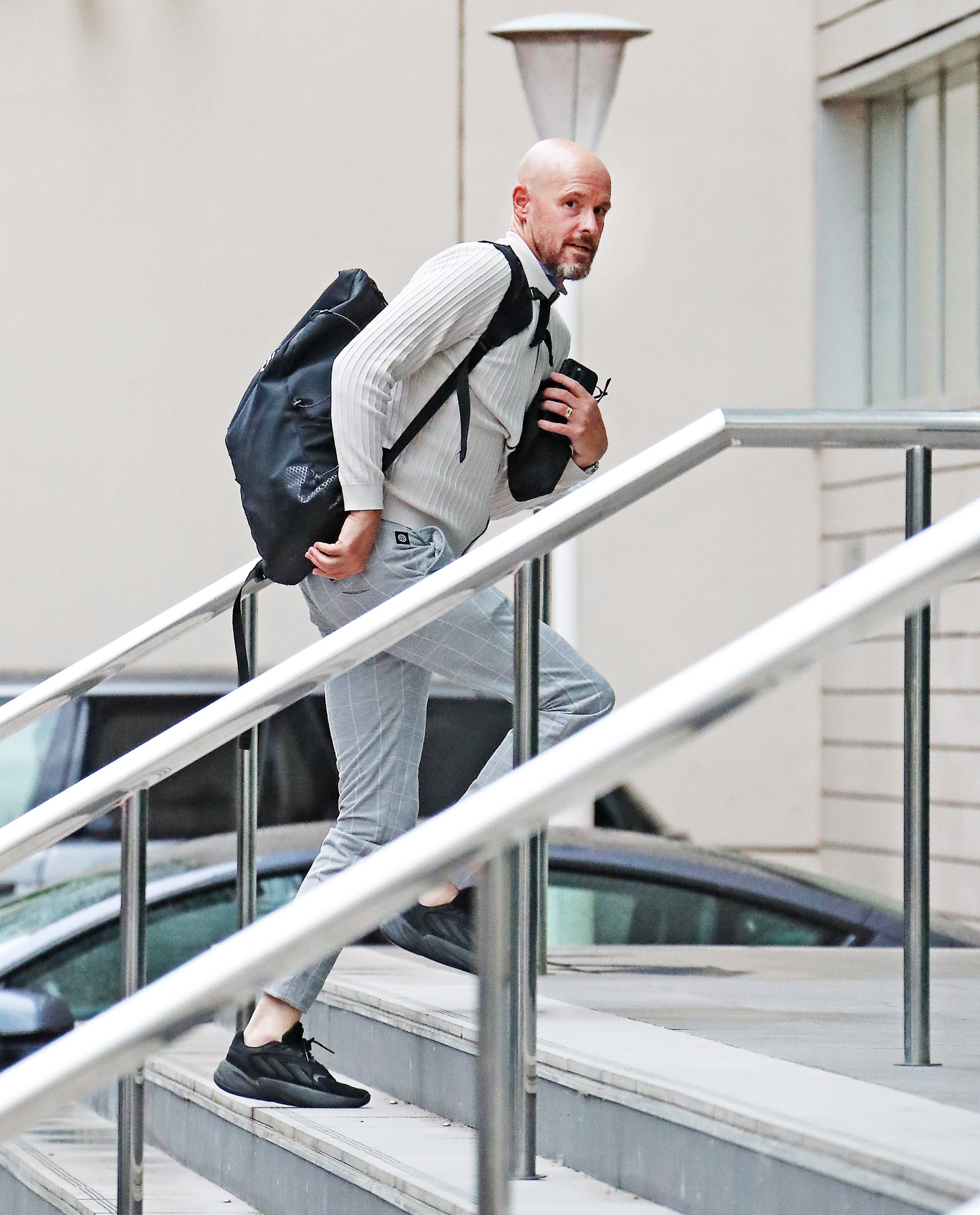 Erik ten Hag has pulled a fashion hat-trick - wearing the same outfit for three days on the trot - pictured on Wednesday