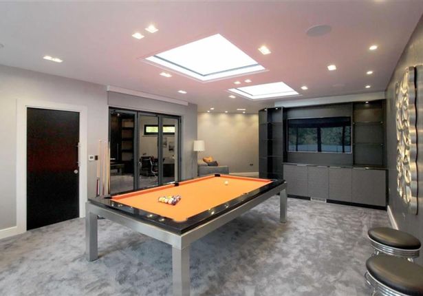 The £3million house also has a games room with a tidy pool table