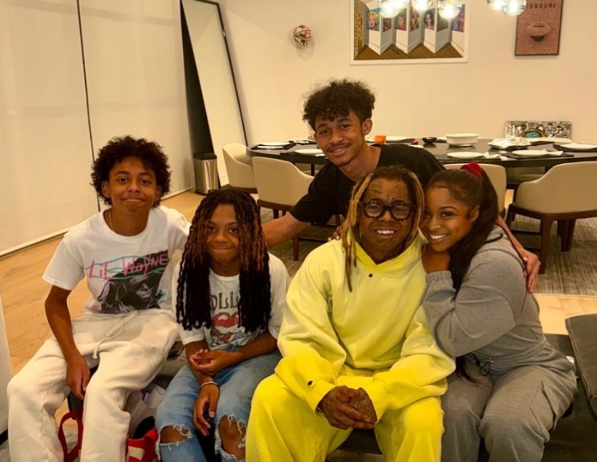 Lil Wayne Celebrated Thanksgiving With His Kids And They're All A Mirror Image Of Their Father | Essence