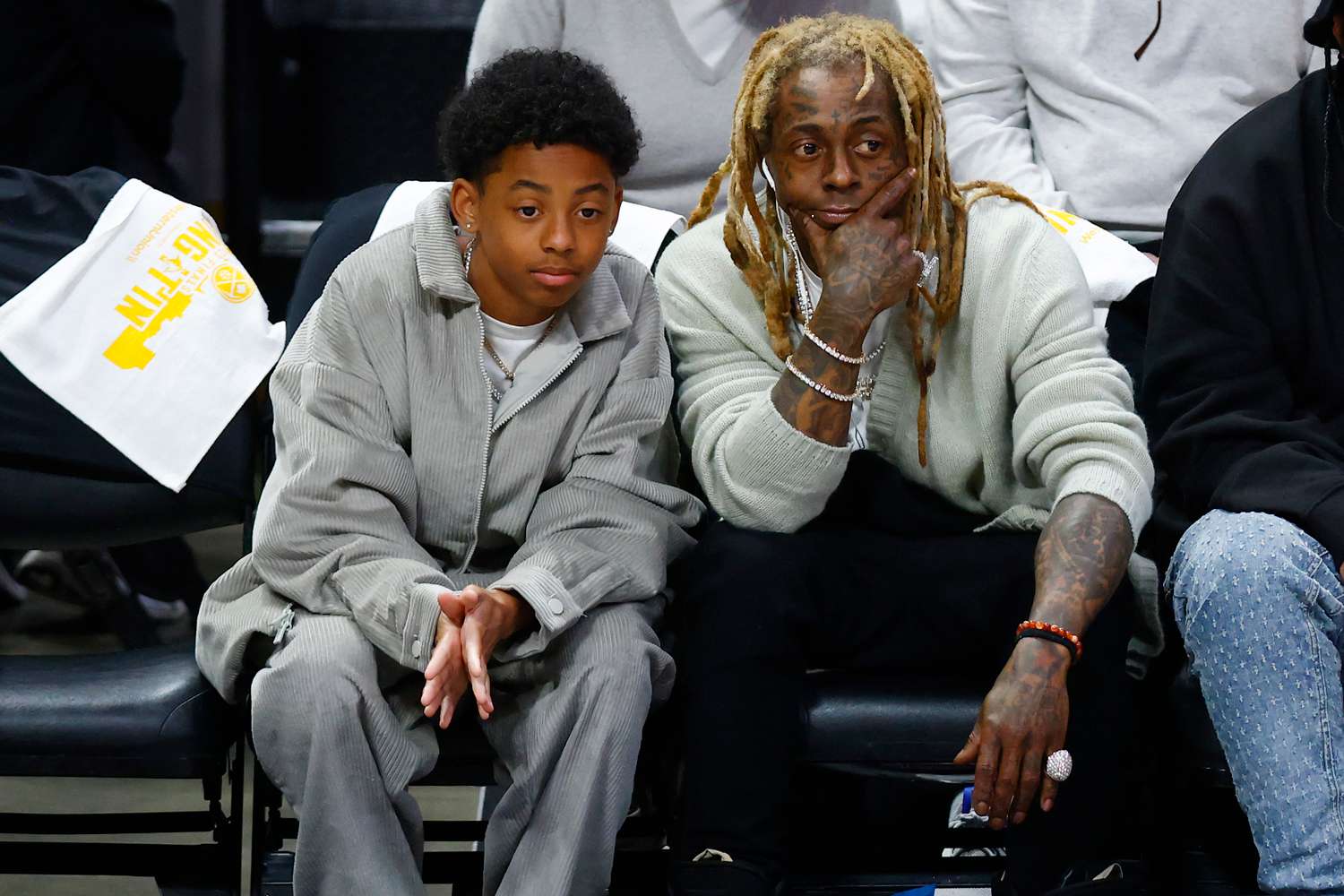 Lil Wayne Sits Courtside with Lookalike Son Kameron, 13, at NBA Finals