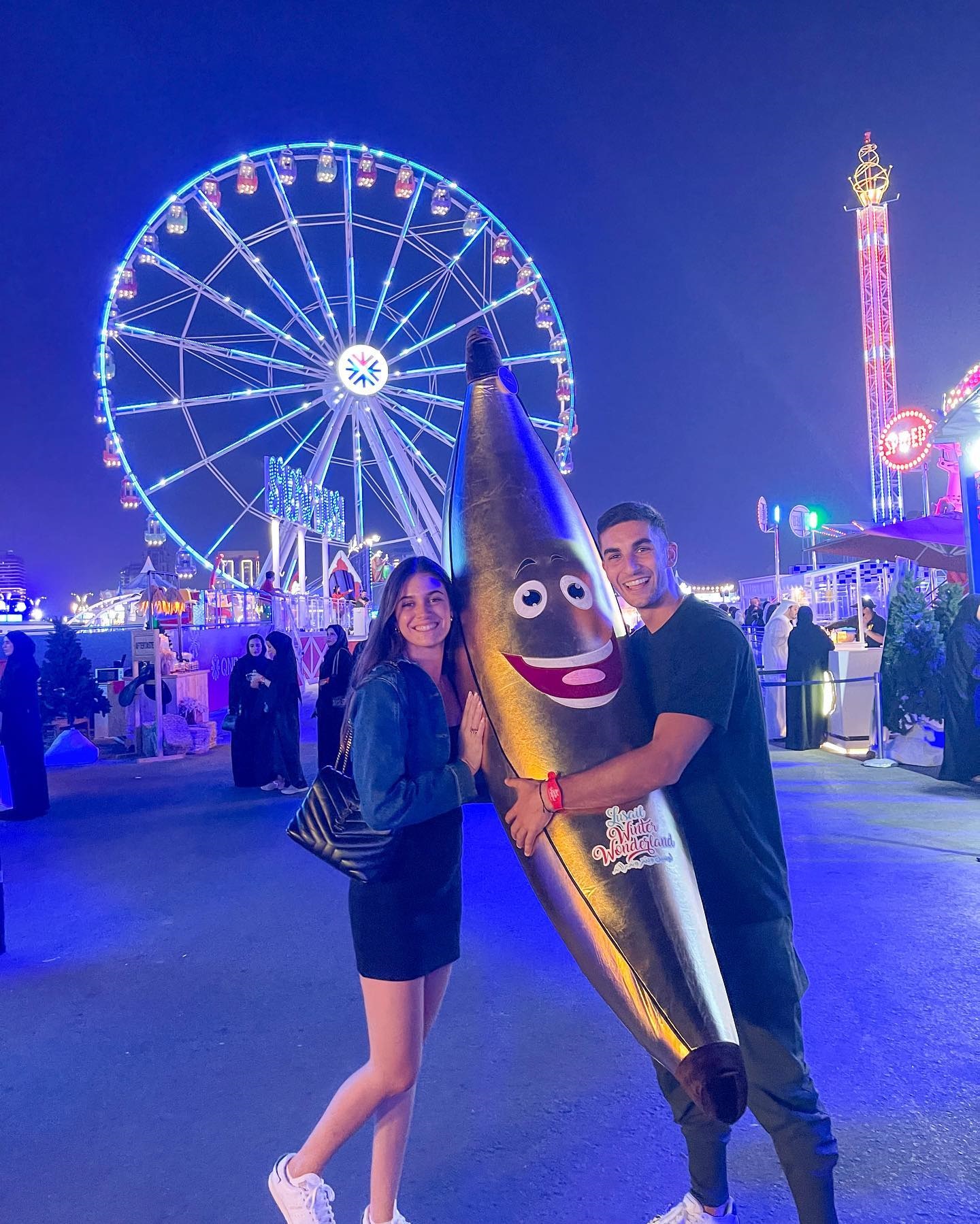 The pair managed to win a prize of a giant banana