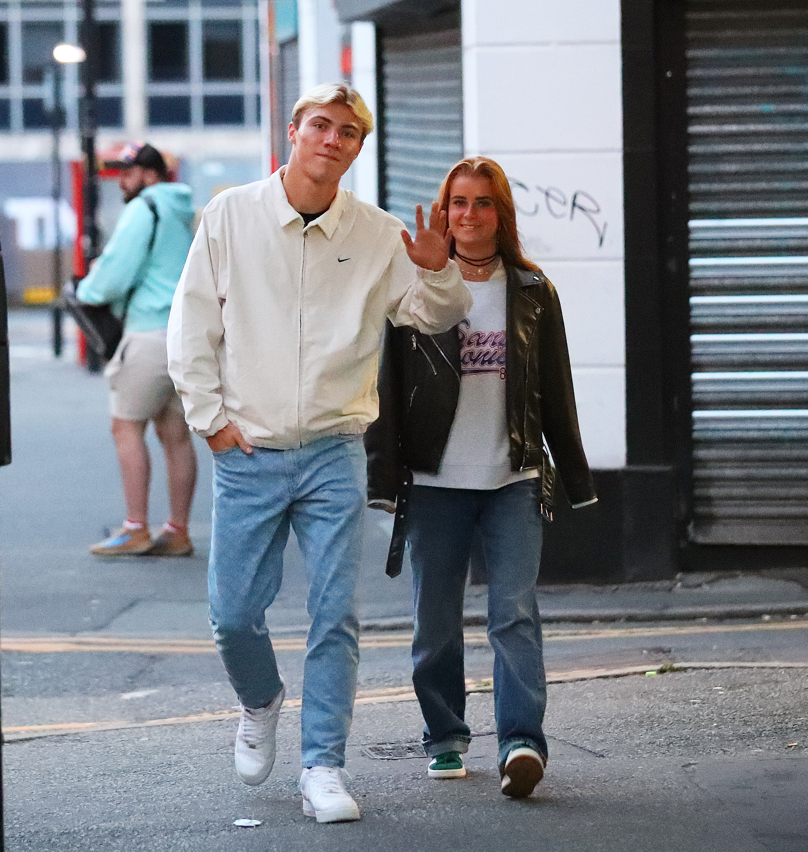 Rasmus Hojlund waves to the camera as £72m Man Utd transfer takes stroll  with Wag Laura Rhod Sondergaard around town | The Sun