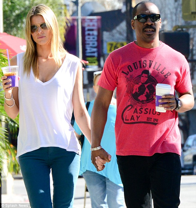 Coffee run: Eddie Murphy, 52, and girlfriend Paige Butcher, 34, were seen with caffeinated beverages in hand in Studio City, California on Thursday