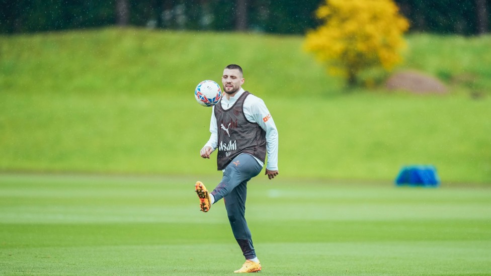 BRING IT DOWN : Mateo Kovacic controls the ball out of the sky