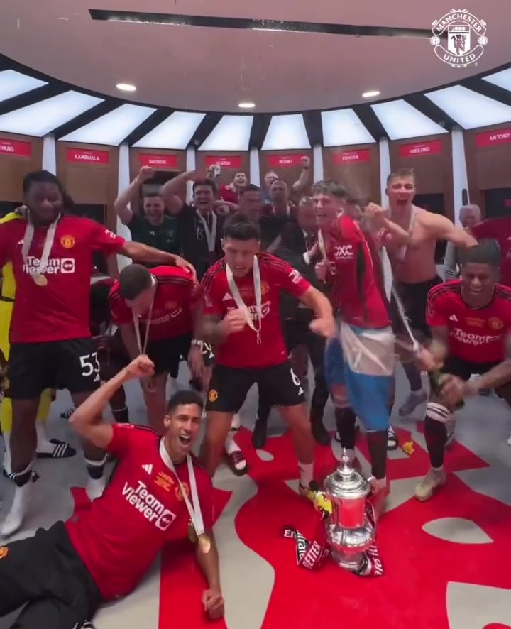 The Red Devils popped more bottles of bubbly as they toasted their success