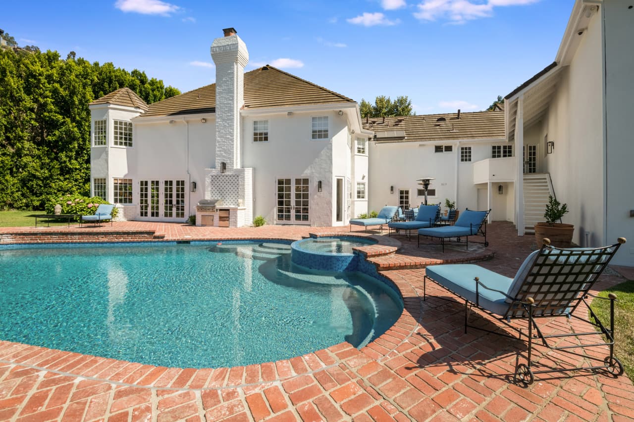 Gated Los Angeles Estate Built by Magic Johnson in 1980s Asks $14.5 Million  - Mansion Global