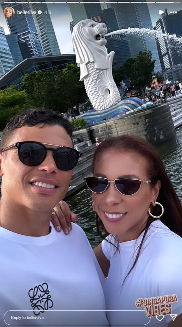 Thiago Silva has jetted off to Singapore with his partner Belle, with the pair seen exploring the Merlion Park