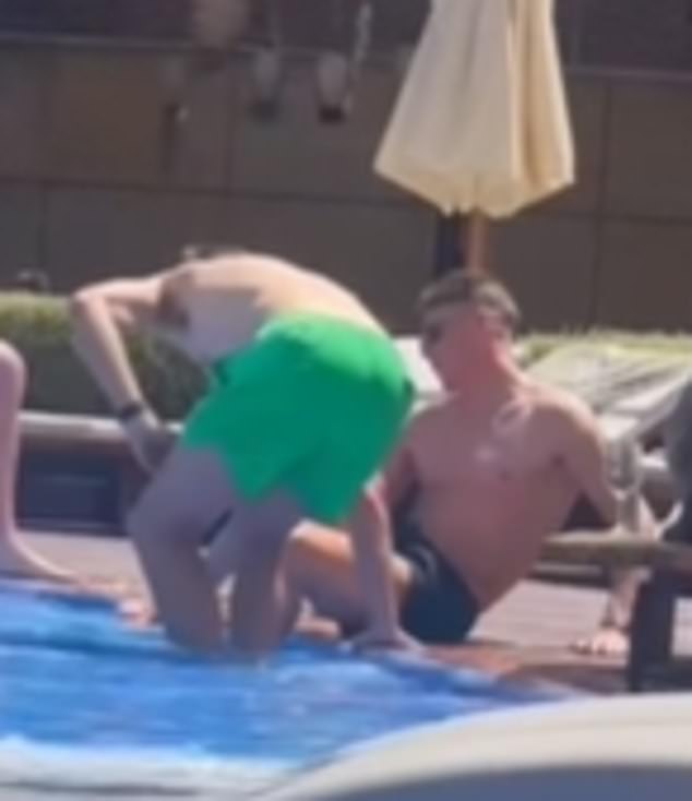 The Man United midfielder appeared to sustain an injury during the match and was seen inspecting his leg while he relaxed by the pool