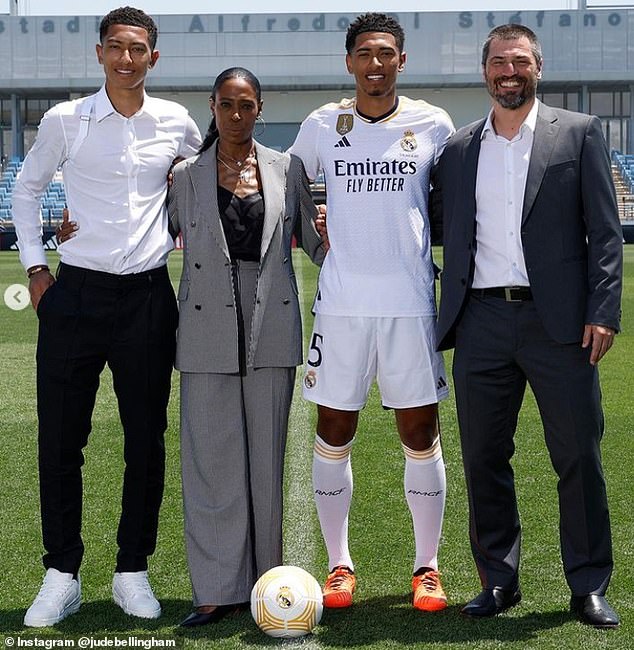 Jude Bellingham's career has gone from strength to strength in recent years, with his parents working diligently in the background to keep him grounded. Pictured: Jude with his family after signing for Real Madrid