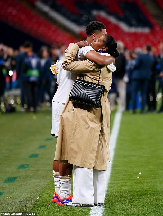 Jude and his mother remained on the Wembley pitch long after the final whistle as they took in the occasion