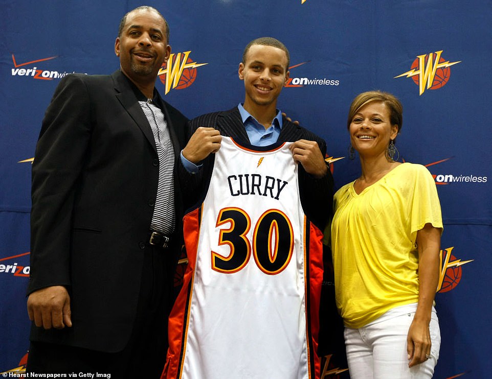 Stephe Curry (center) after being drafted by the Warriors in 2009. He's pictured alongside his parents, Dell and Sonya, the latter of whom has recently filed for divorce