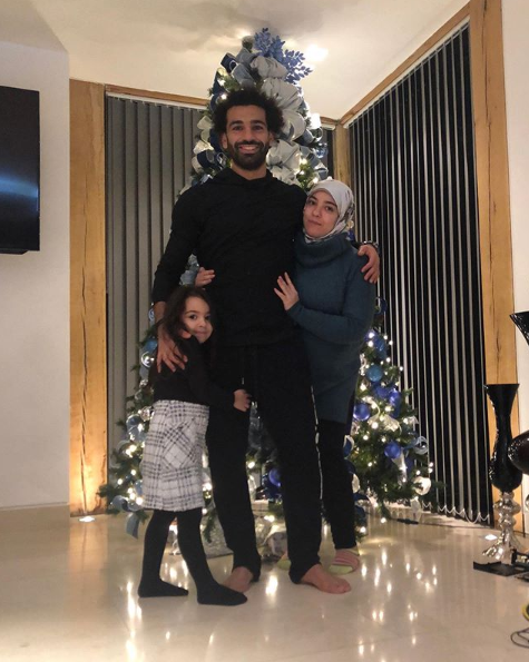 Mo Salah shares rare family picture of himself hugging his wife and daughter as Liverpool ace gets into Christmas spirit – The Sun | The Sun