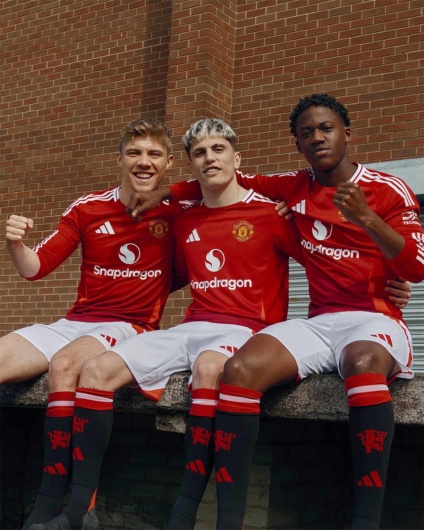 Rasmus Hojlund, Alejandro Garnacho and Kobbie Mainoo took centre stage by replicating their famed celebration in the kit release photo shoot