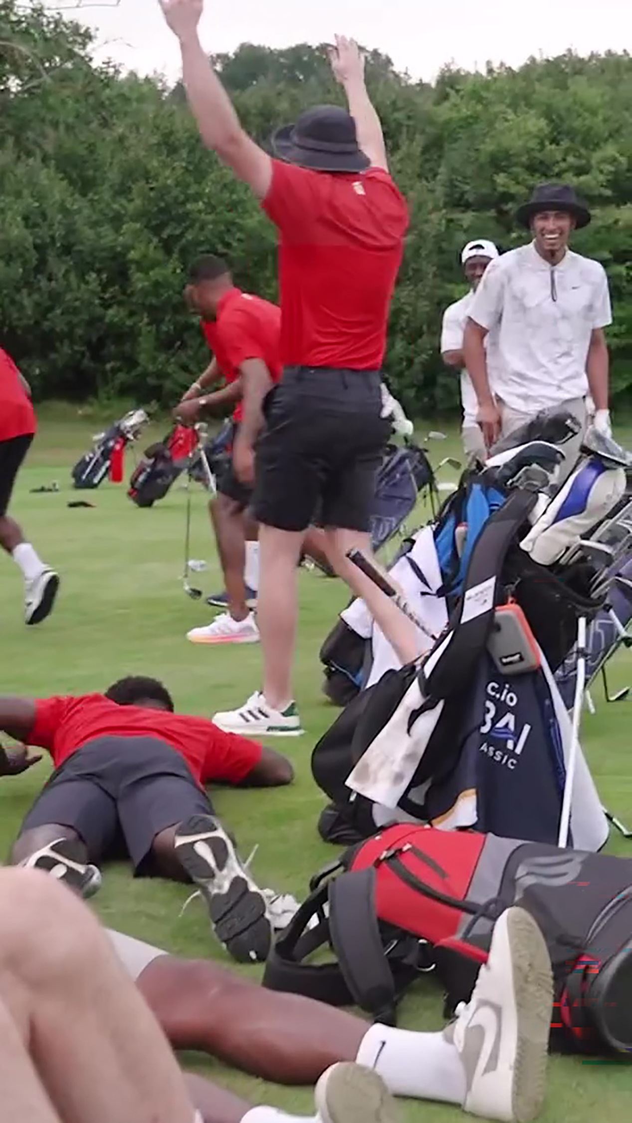 But hero Saka crashed back to earth — as he tripped over a golf bag