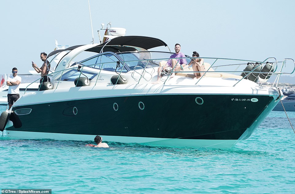 Boat life: The group appeared to be having a great time on board the boat