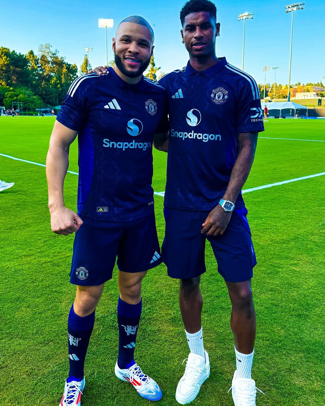 The boxing star with Marcus Rashford