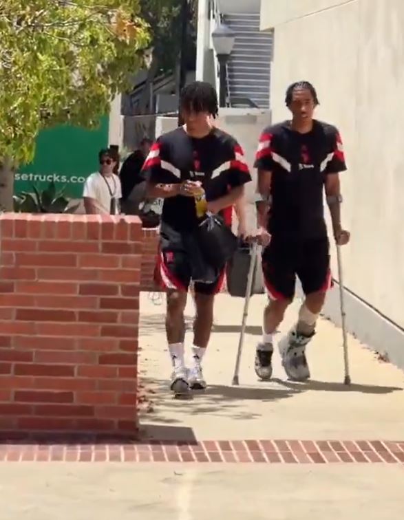 The 18-year-old was seen on crutches at United's training base