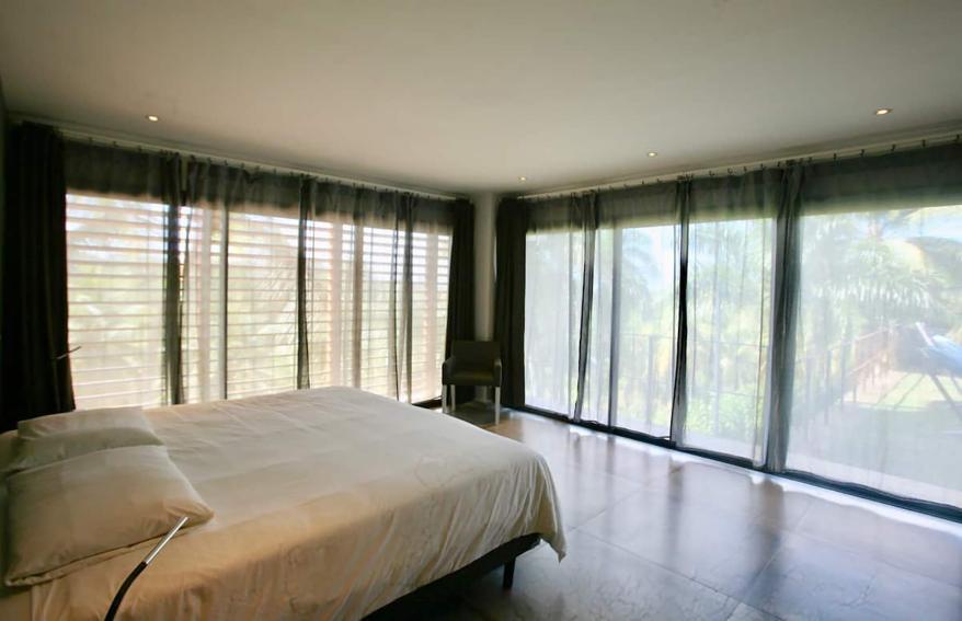 A second of seven bedrooms is pictured.