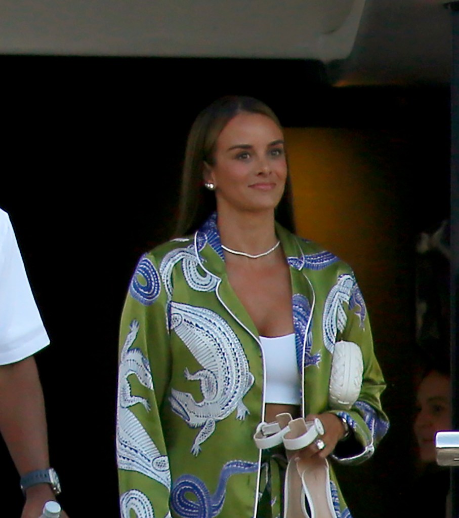 Michael Jordan and his wife, Yvette Prieto, exiting his yacht in Barcelona.