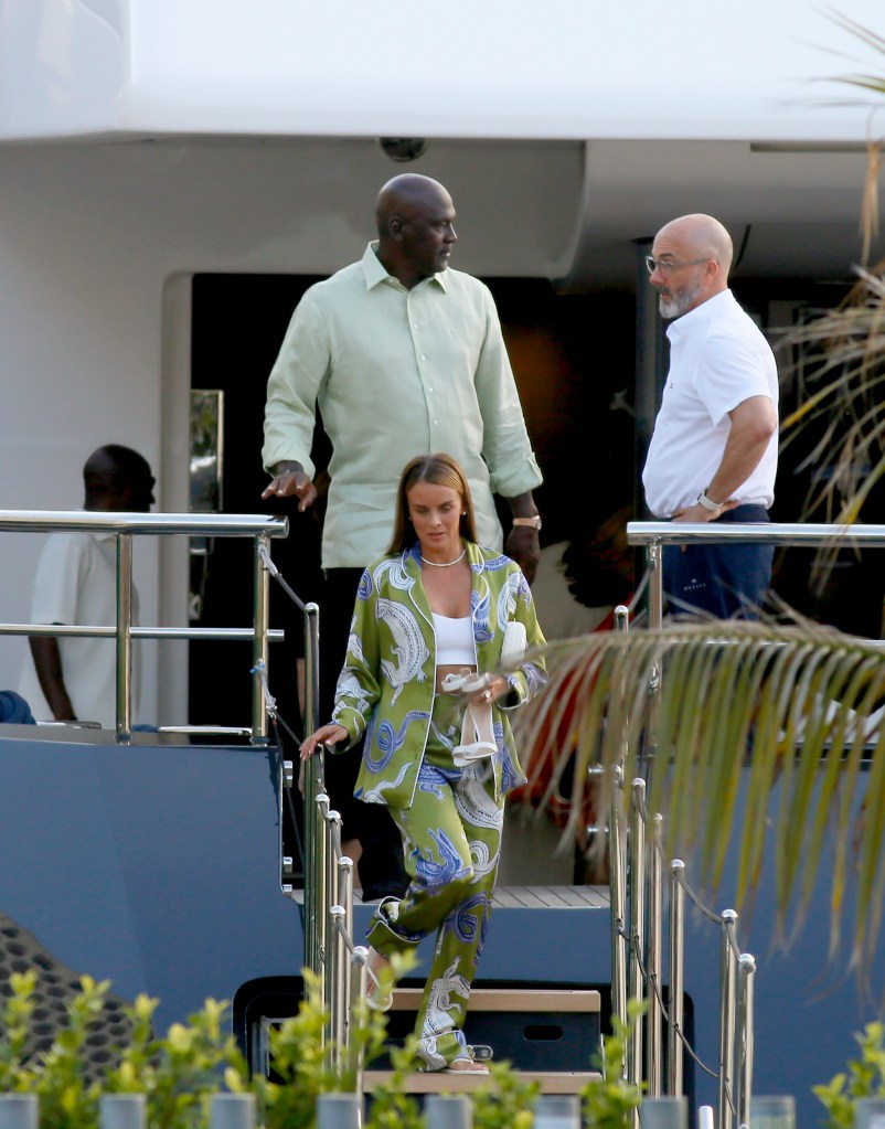 Michael Jordan and his wife, Yvette Prieto, exiting his yacht in Barcelona.