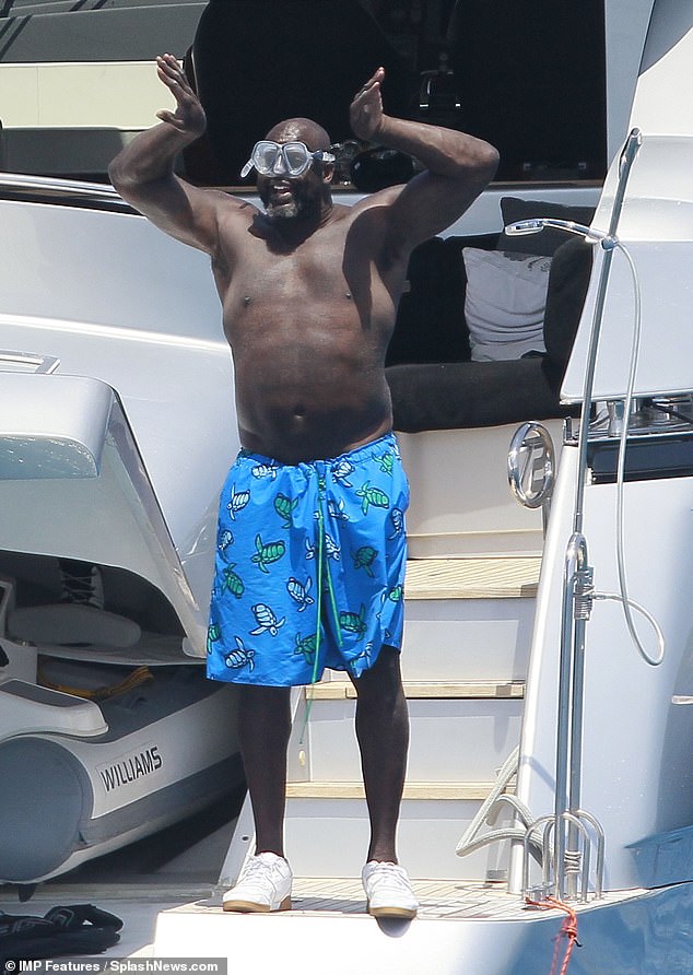 Wander; Shaq showed off his best swimming moves as he prepared to dive