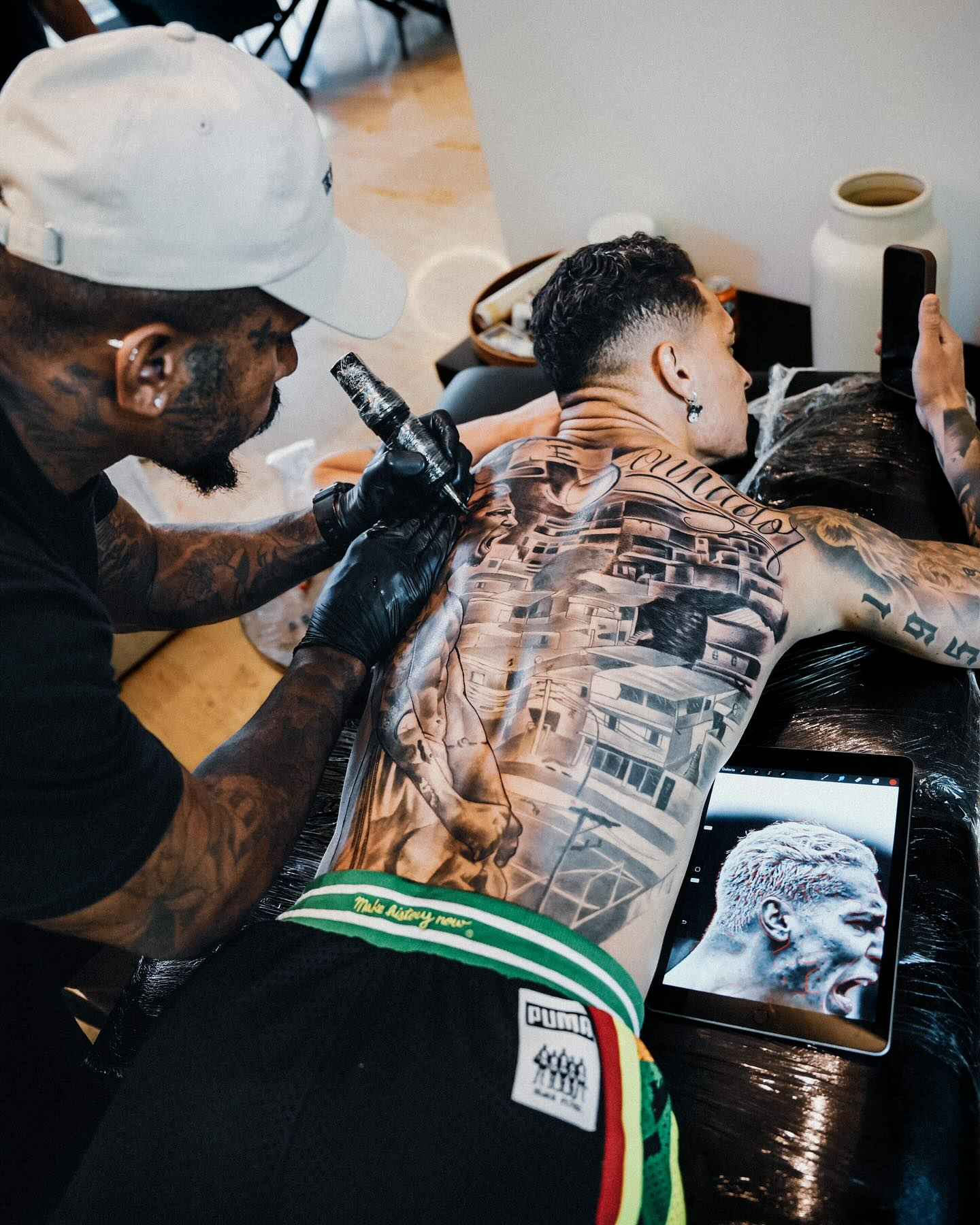 He has a huge image of himself celebrating a goal for Ajax inked on his back