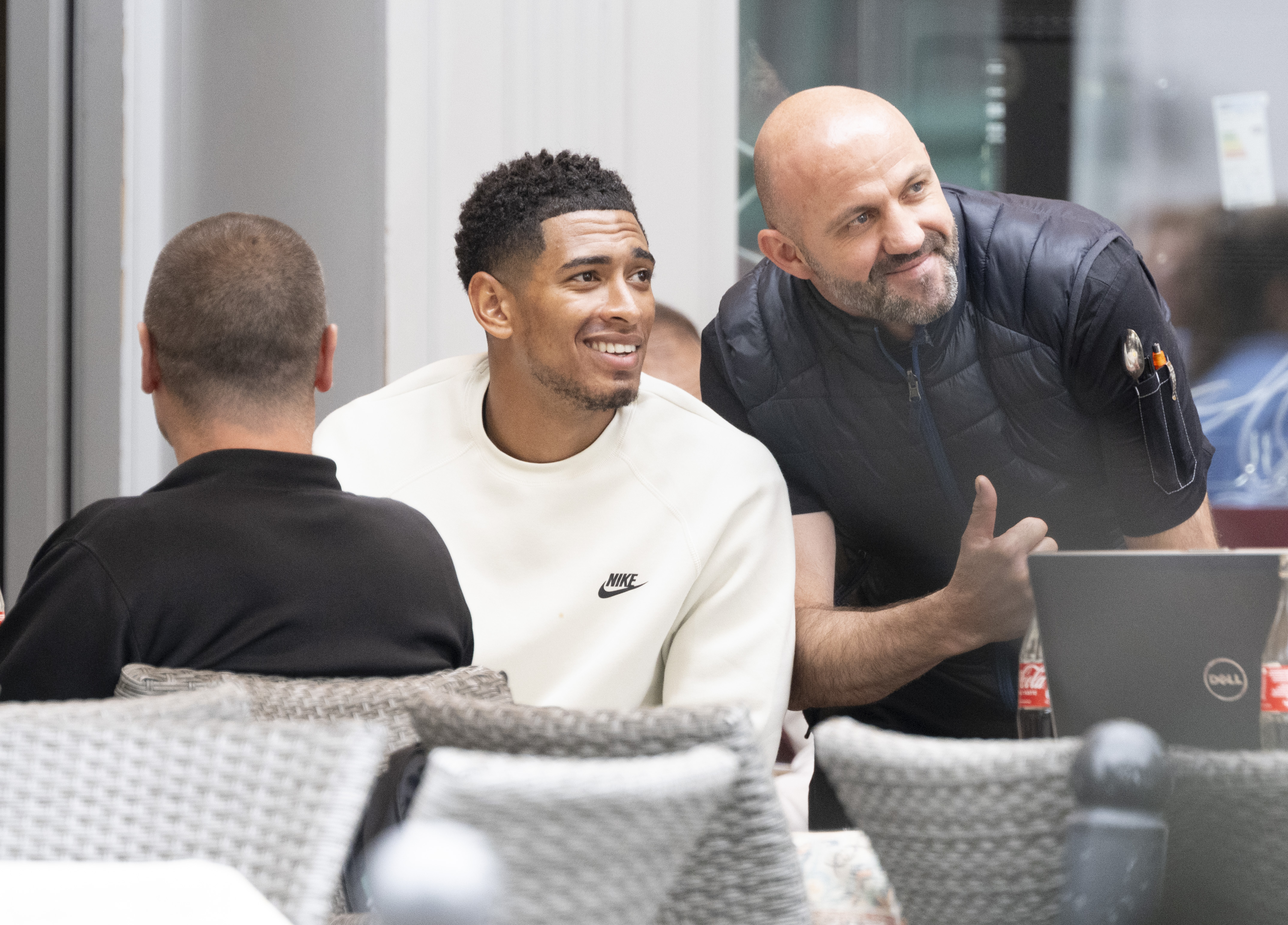 The midfielder relaxed with his mum Denise around 20 miles from England's training base