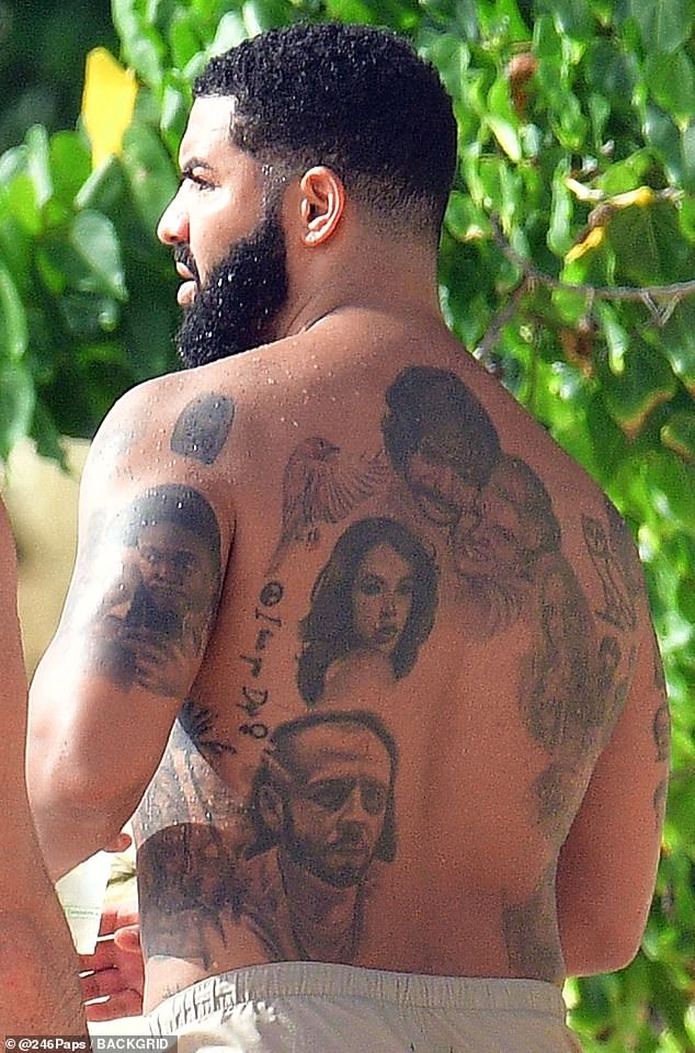 Drake shows tattoo collection with inkings of his producer, family, Lil  Wayne, and Sade in Barbados | Daily Mail Online