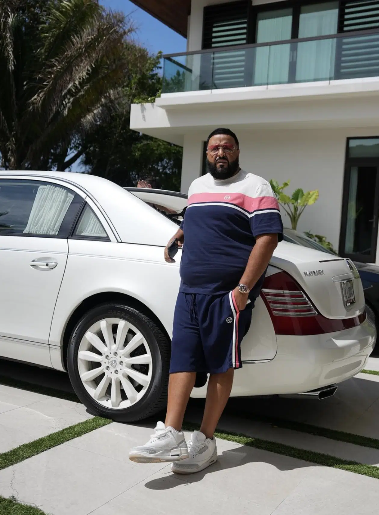 DJ Khaled shows off Scuderia Ferrari F1 car on his driveway